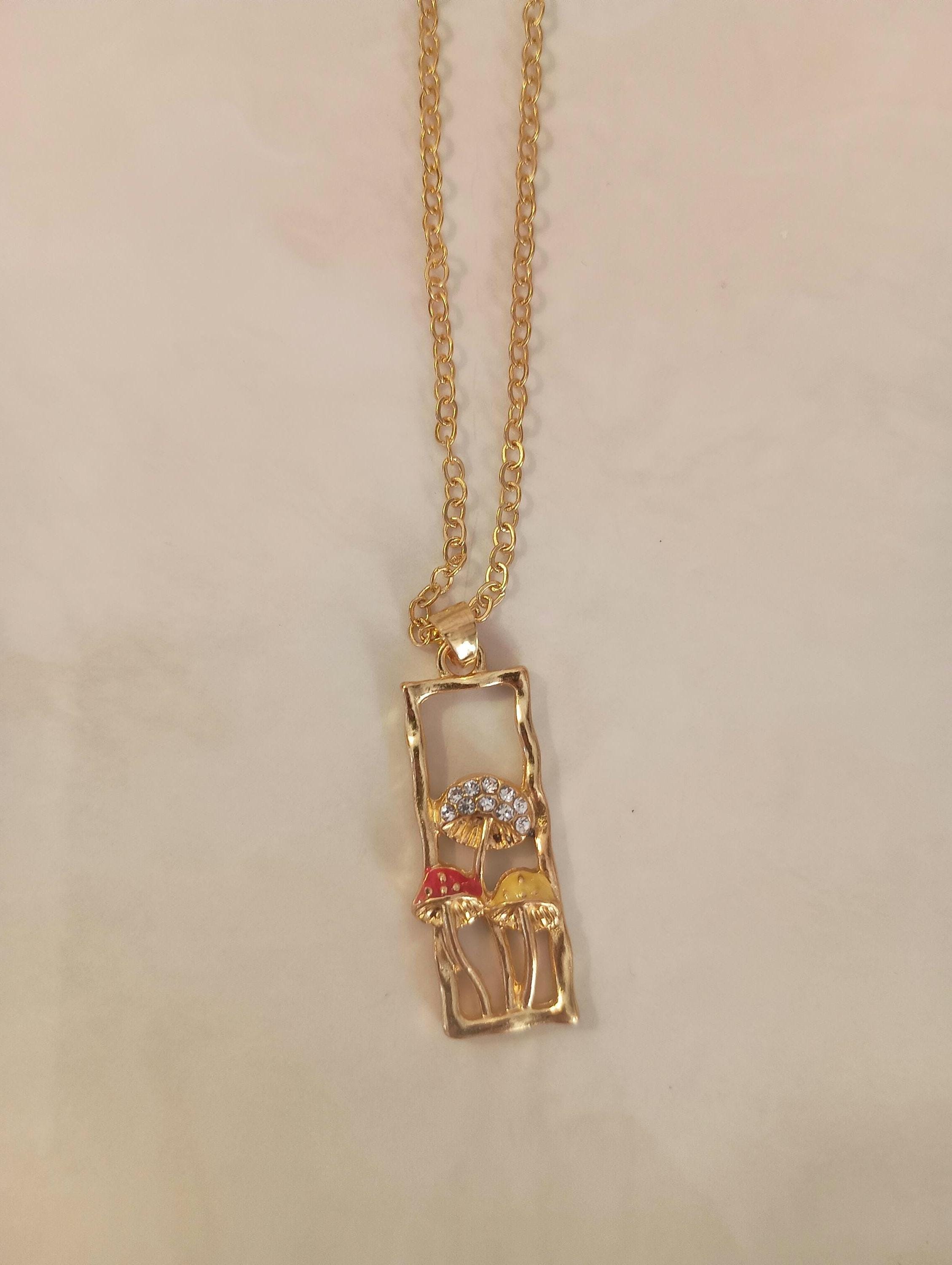 Gold rectangle mushroom necklace. Fairy garden. Whimsical red yellow.