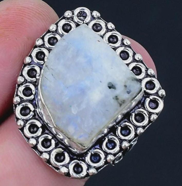 Genuine Moonstone ring size 7 White  light blue Silver setting.