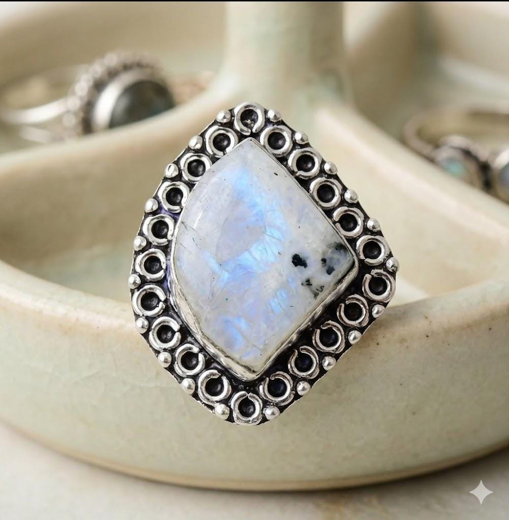 Genuine Moonstone ring size 7 White  light blue Silver setting.